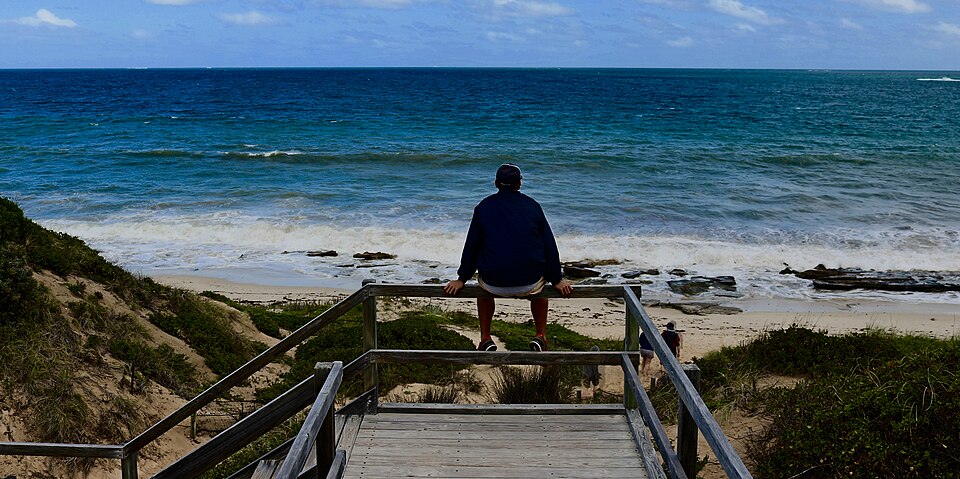 View from a timber beach accessway towards the rocky shore and sea at Burns Beach.