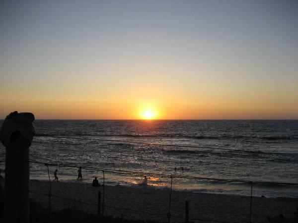 Sun setting over the ocean at Mettams Pool, photographed in 2006.