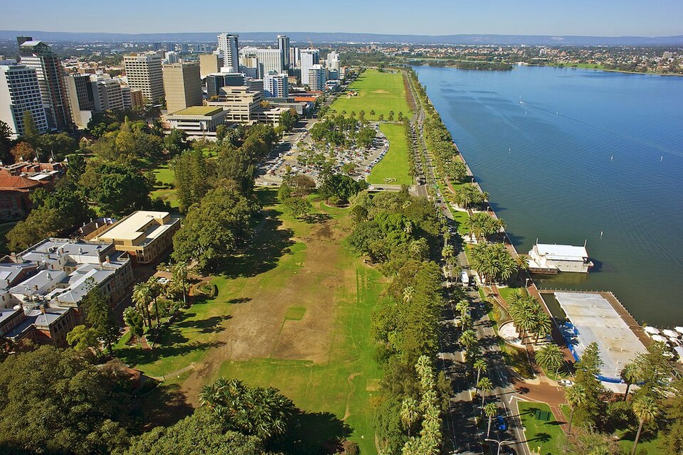 Aerial view of the long grassed Langley Park riverfront