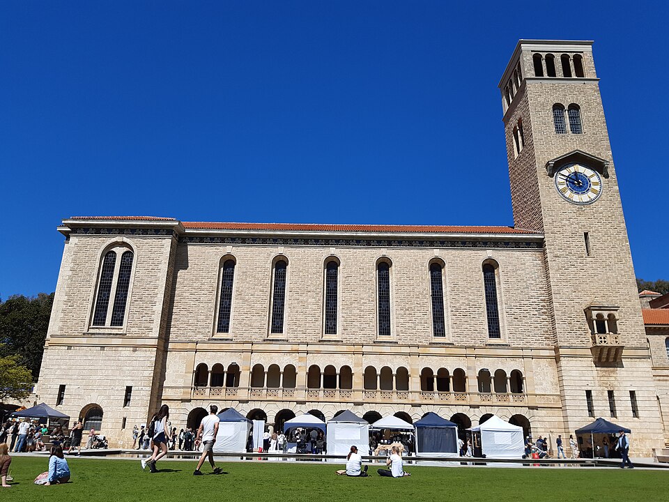 Winthrop Hall clock tower and lawn at the University of Western Australia.